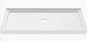 White rectangular shower base with centered drain, ideal for bathroom remodeling projects