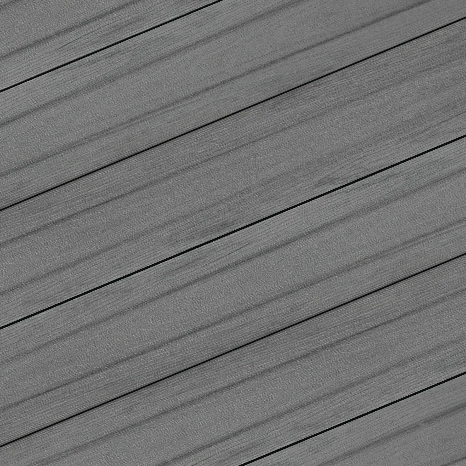Gray composite decking planks with wood grain texture for outdoor patios and walkways