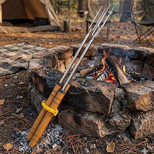 Stainless steel roasting forks with wooden handles near campfire, perfect for outdoor cooking